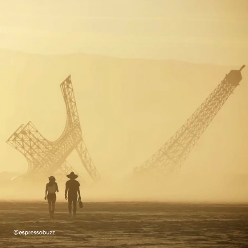 eiffela broken dream de nuit, illuminée sur la playa de black rock city, burning man 2026